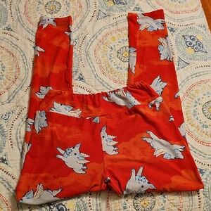 Red LuLaRoe Leggings with Flying Pig Print